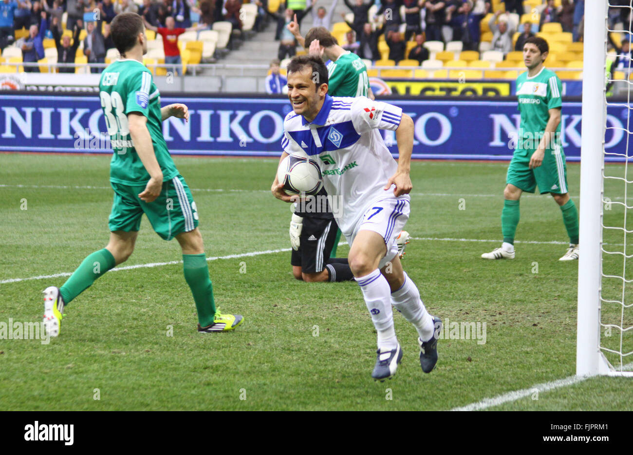KYIV, UKRAINE - APRIL 14, 2012: Carlos Correa of Dynamo Kyiv (R) reacts after he scored a goal during during Ukraine Championshi Stock Photo
