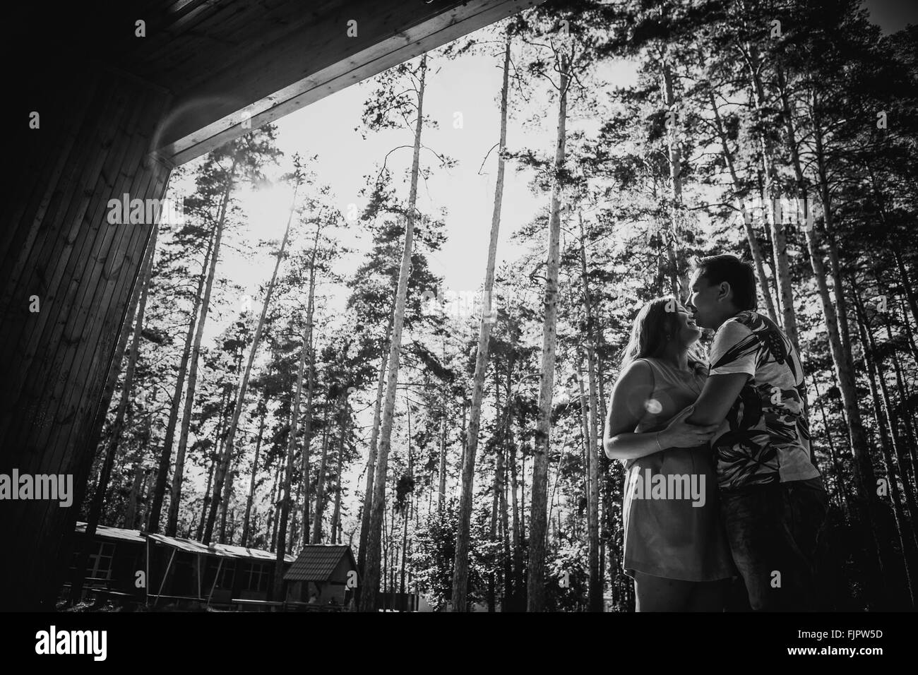 Black white photography romantic young couple kissing on background ...