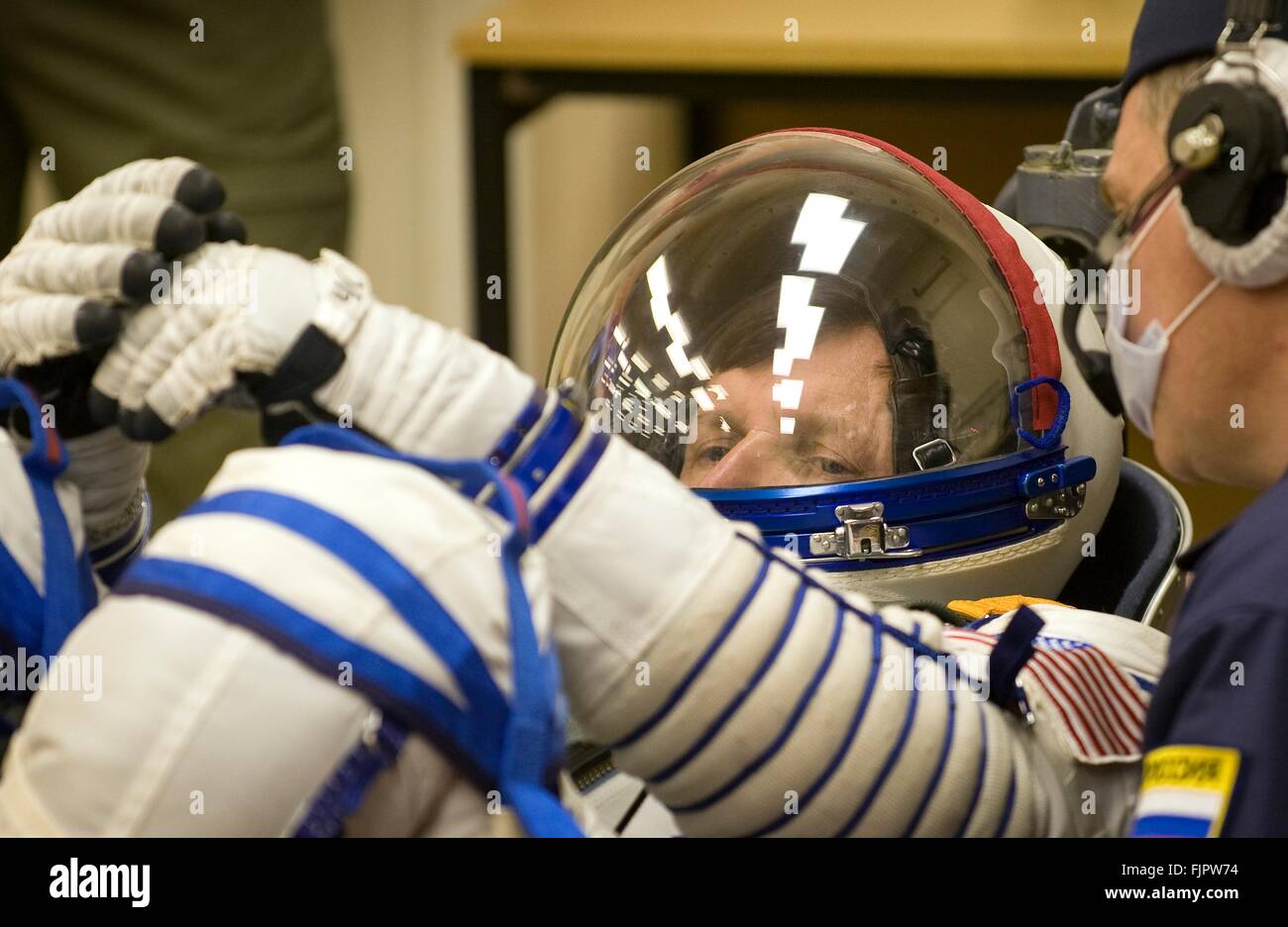 Hungarian-born American space tourist Charles Simonyi has his Russian sokol spacesuit pressure checked ahead of launch onboard the Soyuz spacecraft to the International Space Station Spaceflight on Expedition19 March 26, 2009 in Baikonur, Kazakhstan. Simonyi joins crew members Gennady Padalka and Michael Barratt on the mission. Stock Photo