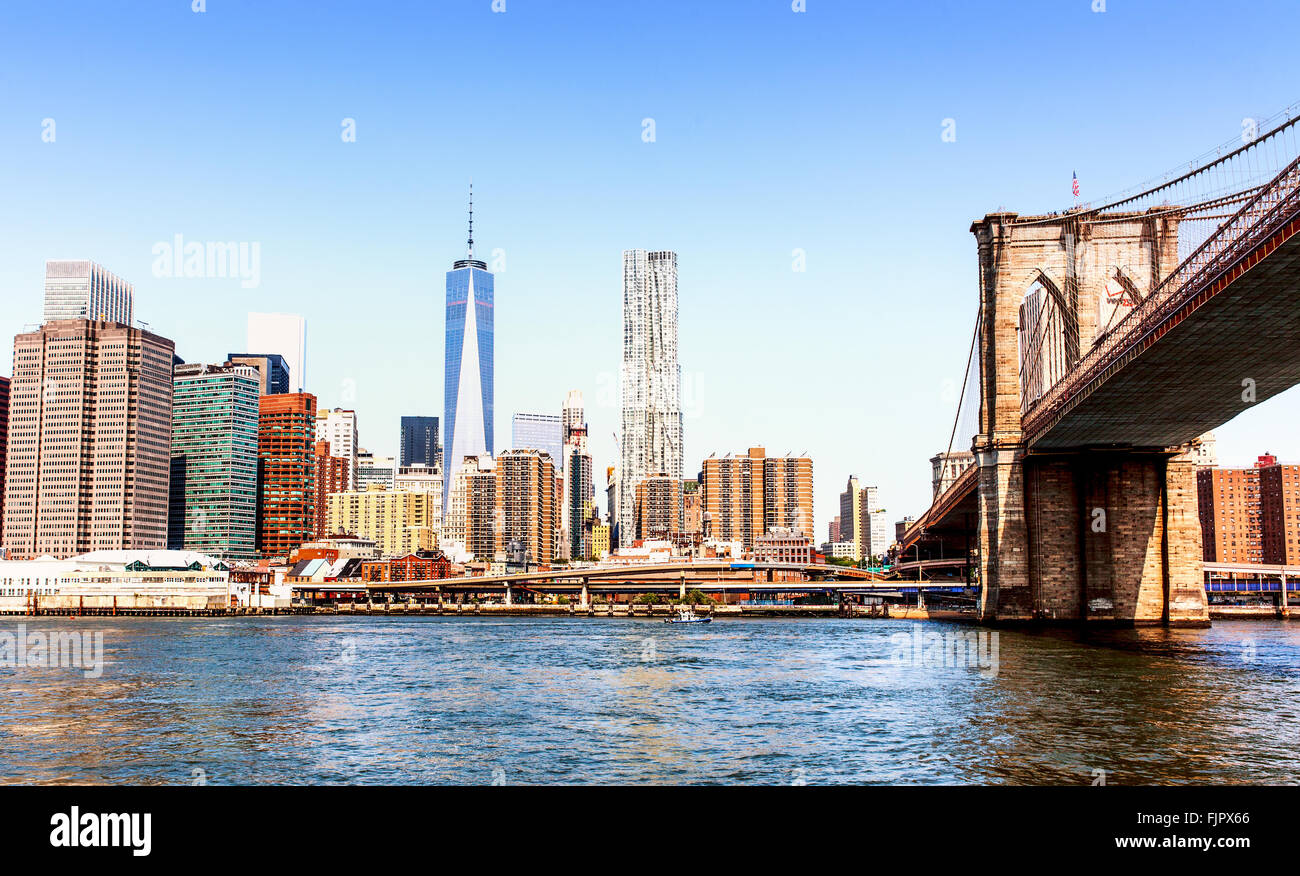 The skyline and Brooklyn Bridge in Manhattan, New York City Stock Photo ...