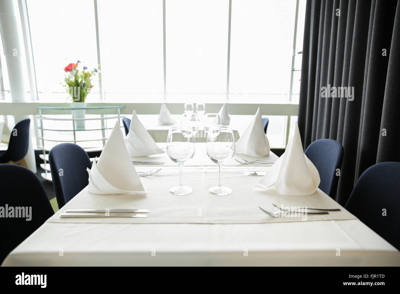 decorated table at restaurant Stock Photo Alamy