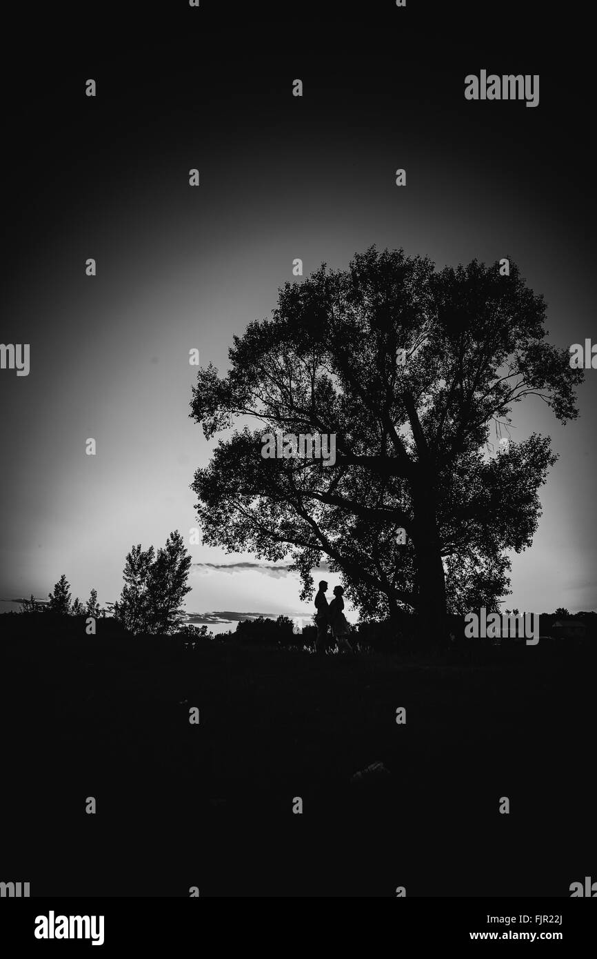 Black white photography romantic couple standing and kissing on ...