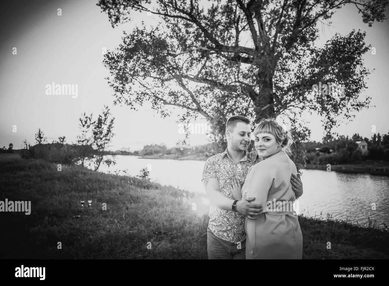Black white photography romantic couple standing and kissing on ...