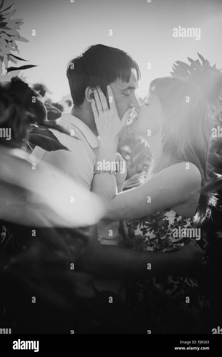 Black white photography romantic couple standing and kissing on ...