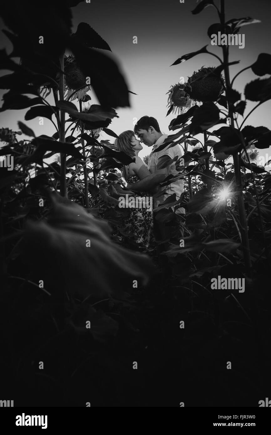 Black white photography romantic couple standing and kissing on ...
