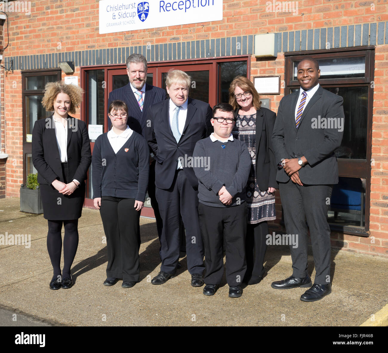 Sidcup, UK. 3rd March, 2016. The Mayor of London Boris Johnson poses with Nigel Walker, head teacher and Linda Lee, head teacher of Marlborough School along with students before he formally opened the new sixth form building at Chislehurst and Sidcup Grammar School, which has been created by re-using one of the buildings from London's 2012 Olympic and Paralympic Game Credit: Keith Larby/Alamy Live News Stock Photo