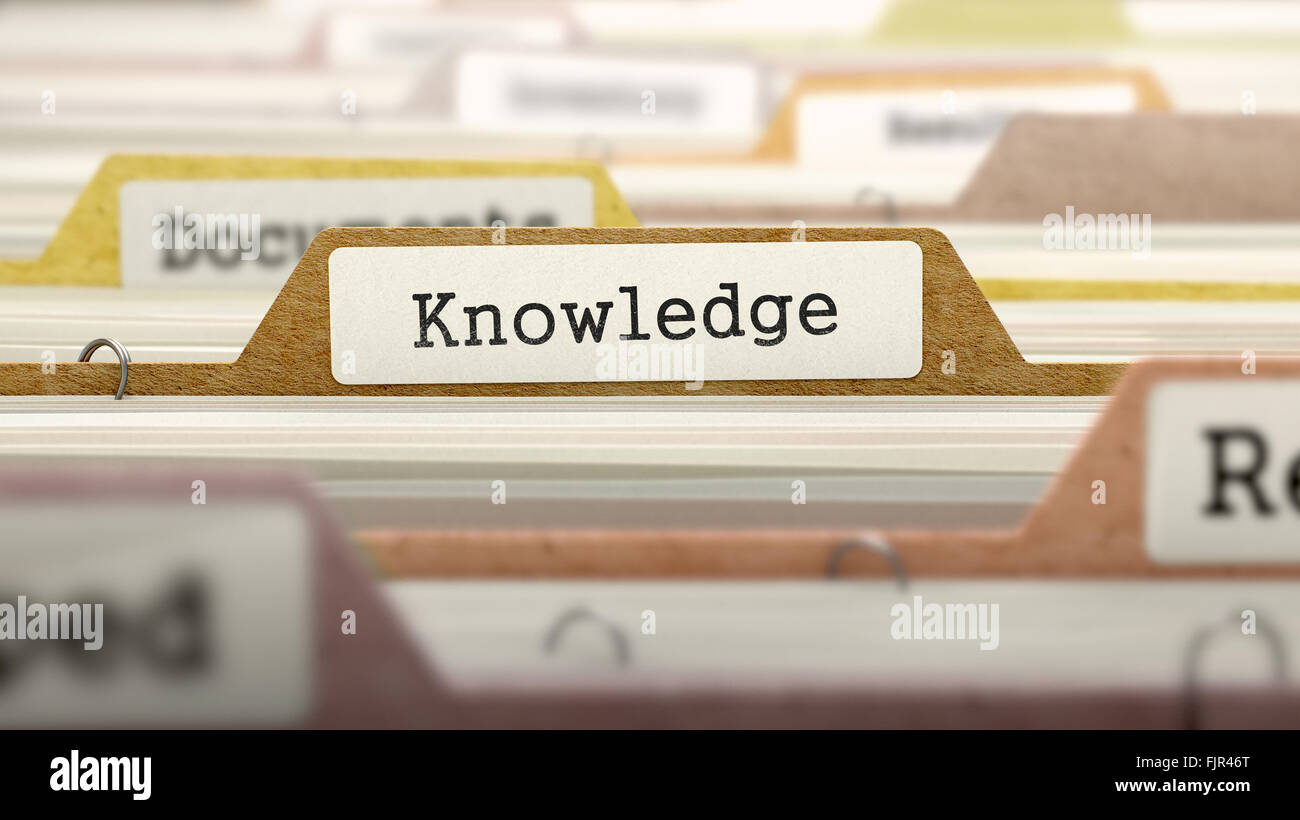 Knowledge Concept. Folders in Catalog. Stock Photo