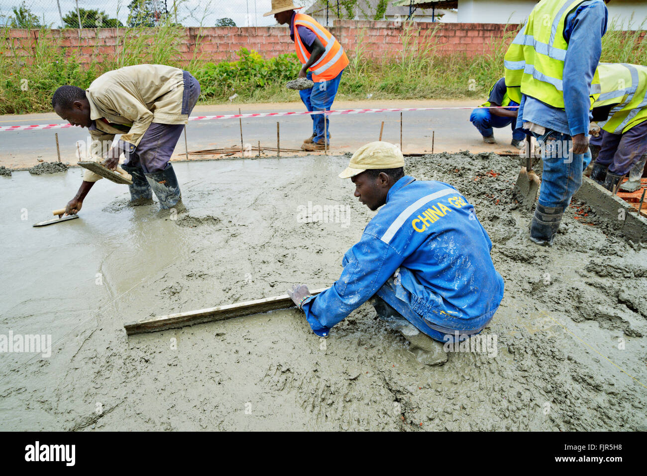 Workers making a new road in Lusaka, the capital of Zambia. Stock Photo
