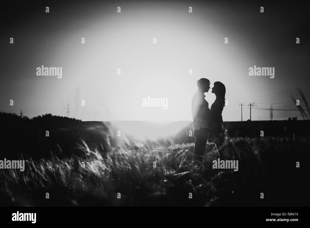 Silhouette couple kissing Black and White Stock Photos & Images - Alamy