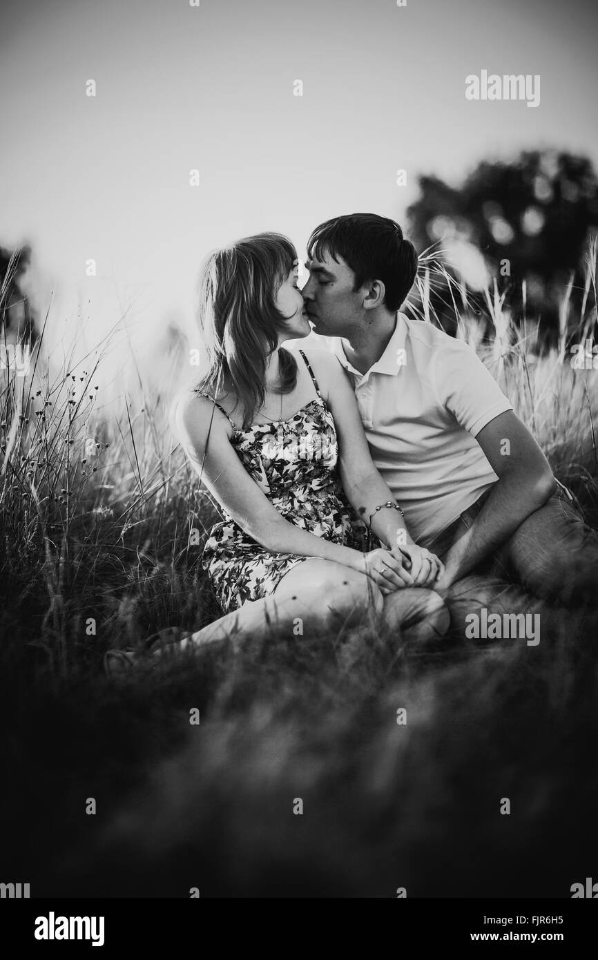 Black white photography romantic couple standing and kissing on ...