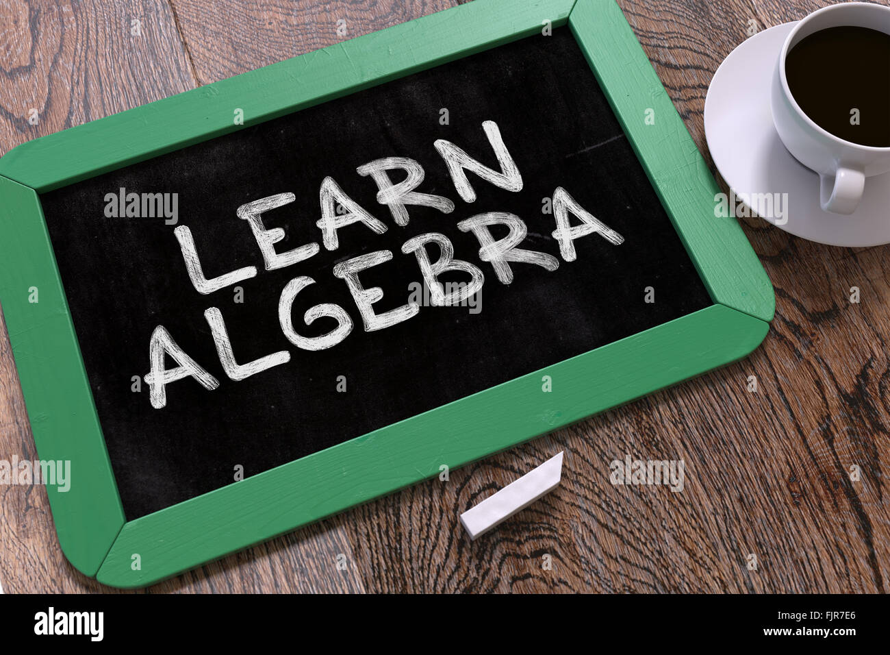 Learn Algebra Concept Hand Drawn on Chalkboard. Stock Photo