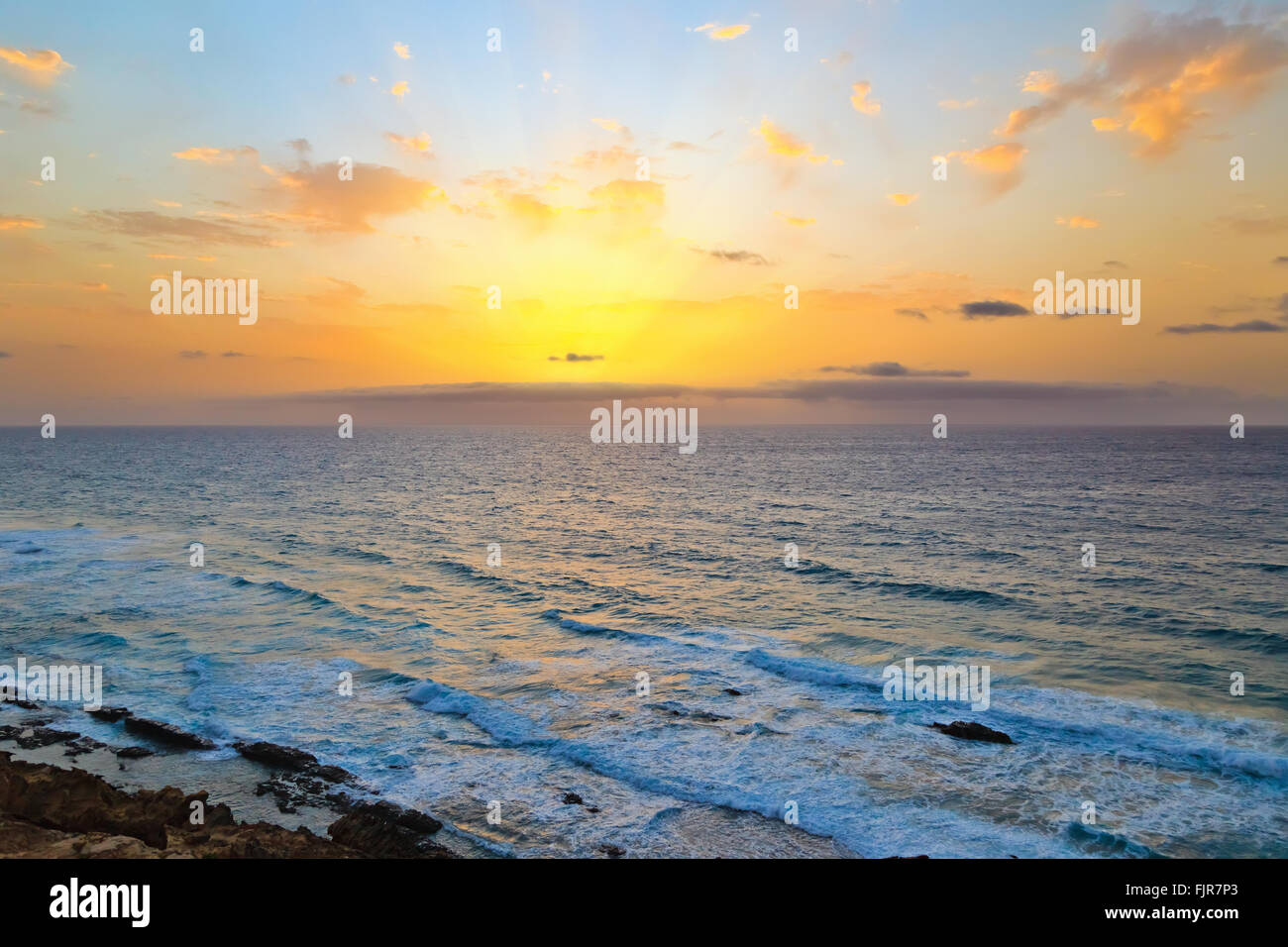 Sunrise over Atlantic ocean Stock Photo - Alamy