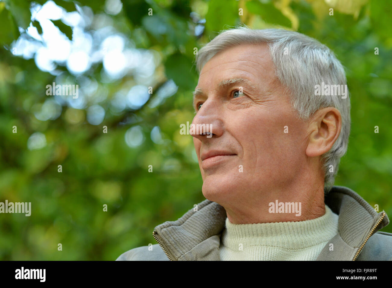 Cheerful elderly man hi-res stock photography and images - Alamy