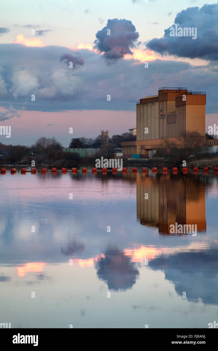 Flour Mill Reflected in the River Aire at Dusk Knottingley West Yorkshire England Stock Photo