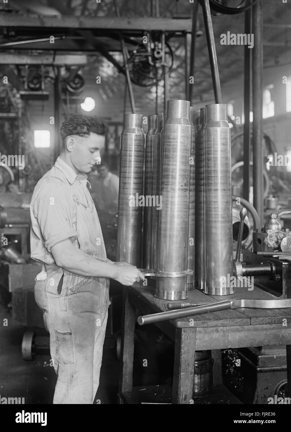 Worker Manufacturing Torpedoes at Navy Yard, Washington DC, USA, circa 1939 Stock Photo
