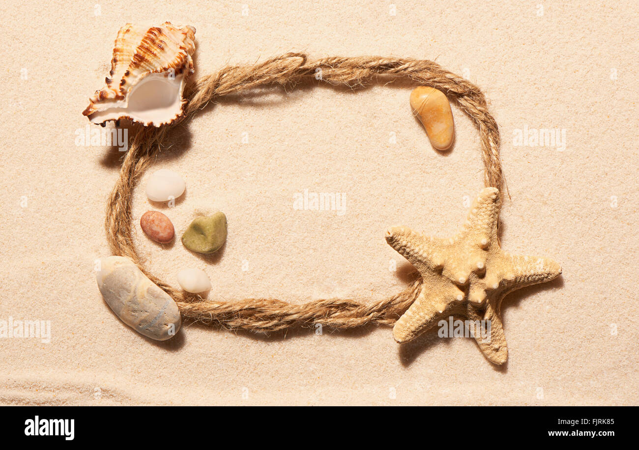 Sand stones beach rope hi-res stock photography and images - Alamy