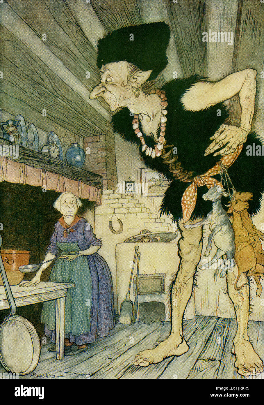 Jack and the Beanstalk, English fairy tale. Jack peeps into the ogre's kitchen and sees the ogre and his wife. Caption reads: 'Fee-fi-fo-fum, I smell the blood of an Englishman'. Illustration by Arthur Rackham (1867 - 1939) Stock Photo