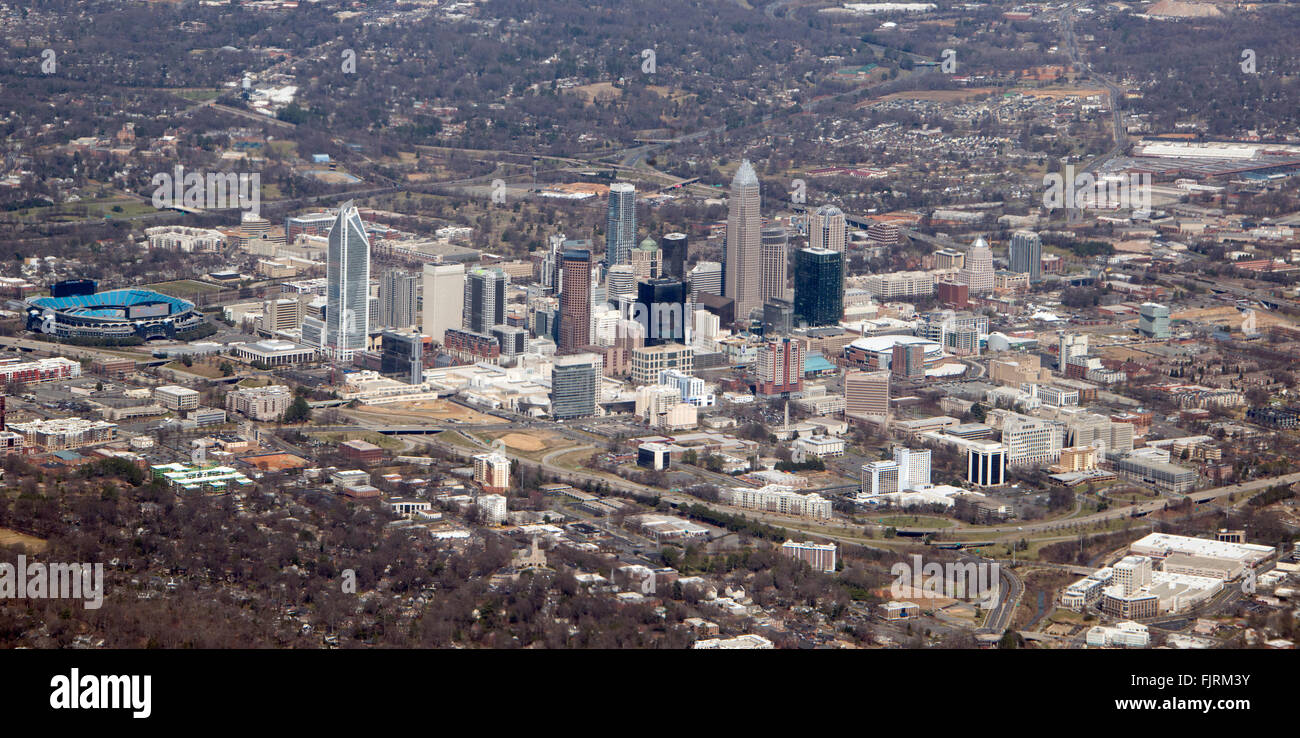 View of Charlotte, North Carolina from a commercial airliner on Sunday, February 28, 2016. Clearly visible landmarks include Bank of America Stadium, home of the Carolina Panthers, at left, the Duke Energy Center, Hearst Tower, the Bank of America Corporate Center, and the Time Warner Cable Arena, at center right, home of the NBA Charlotte Hornets. Credit: Ron Sachs/CNP - NO WIRE SERVICE - Stock Photo