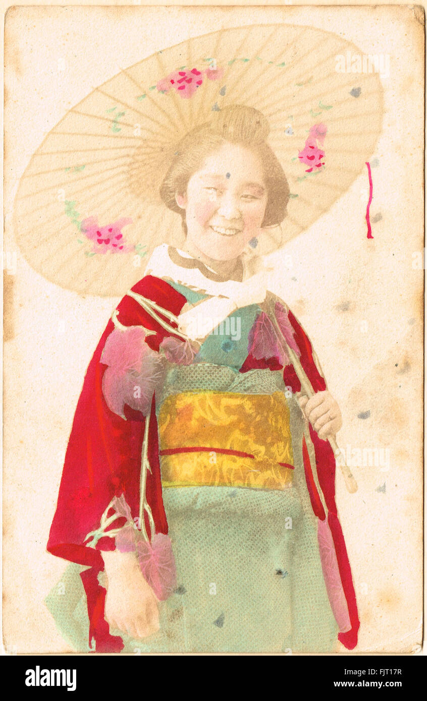 Hand Coloured geisha girl.  Early 20th century postcard Stock Photo