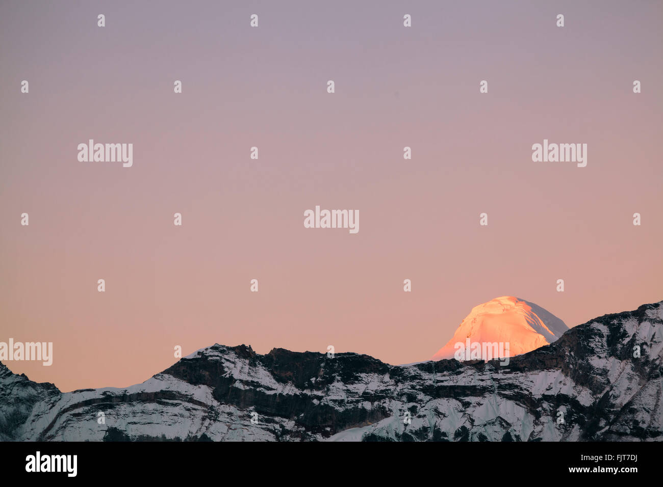 Dawn light on the Khatang peak. Sagarmatha National Park. Solukhumbu ...