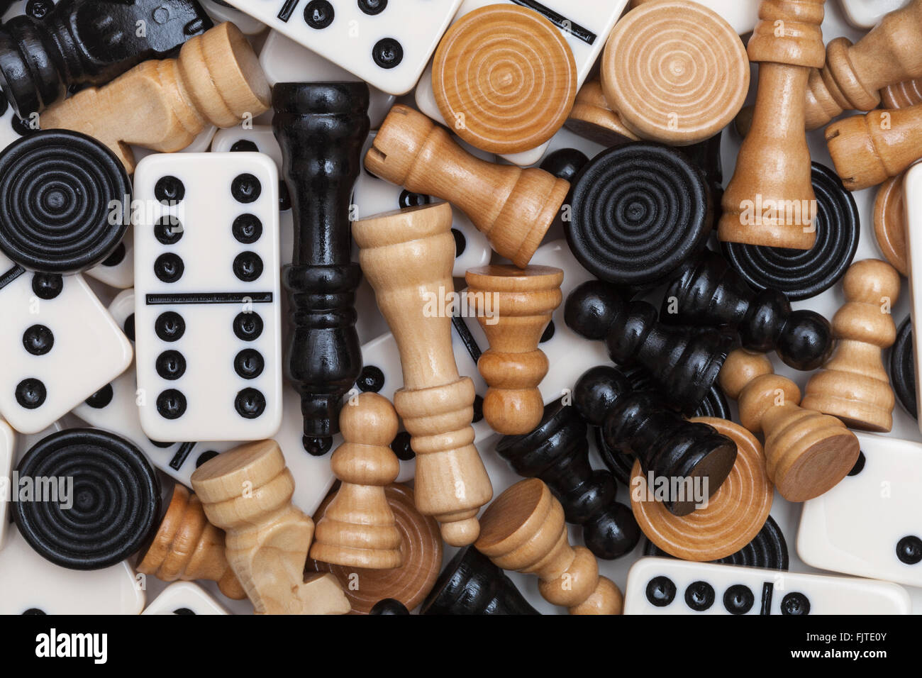 Dominoes,chess pieces and draughts (checkers.) Stock Photo