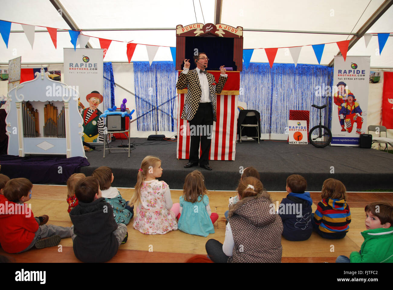 Punch & Judy show at 2013 Morris Centenary celebrations at Cornbury Park, Charlbury Oxford, United Kingdom Stock Photo