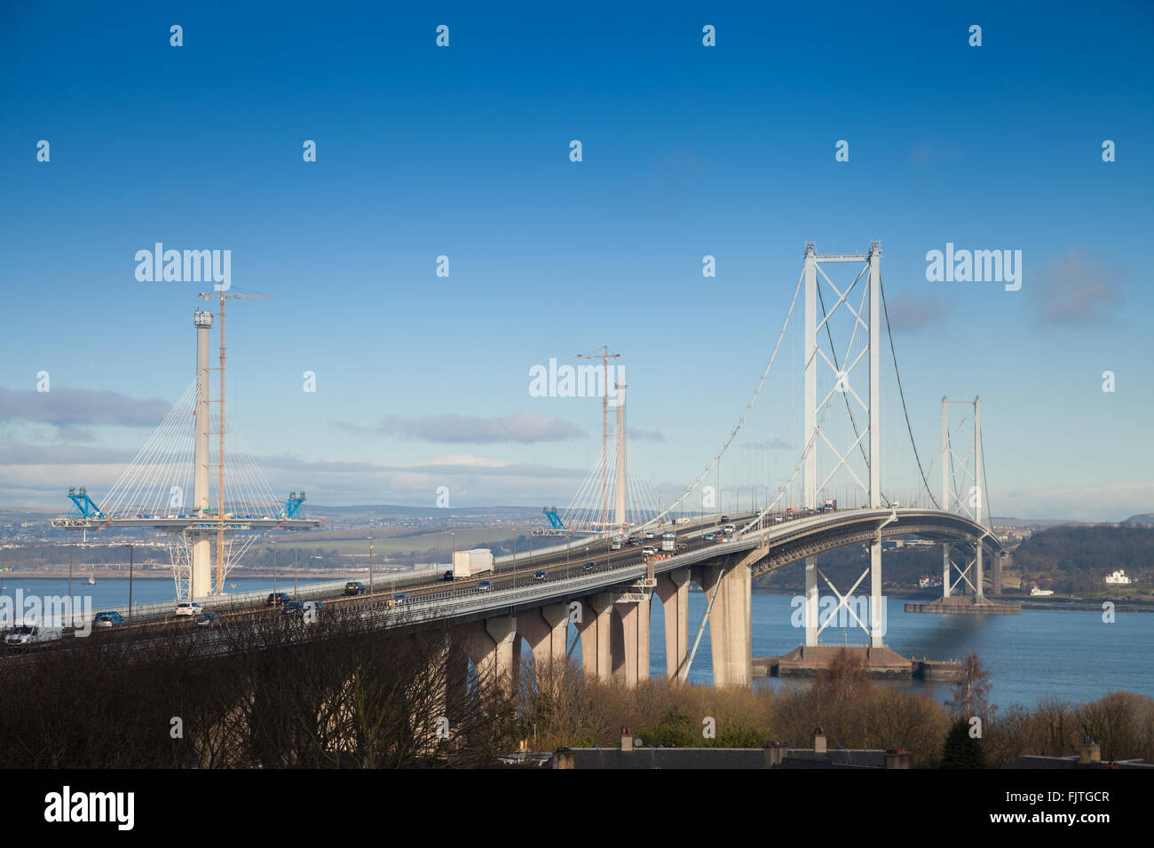 Looking North towards the Forth Road Bridge with the new Queensferry Crossing in the background, South Queensferry, Edinburgh. Stock Photo