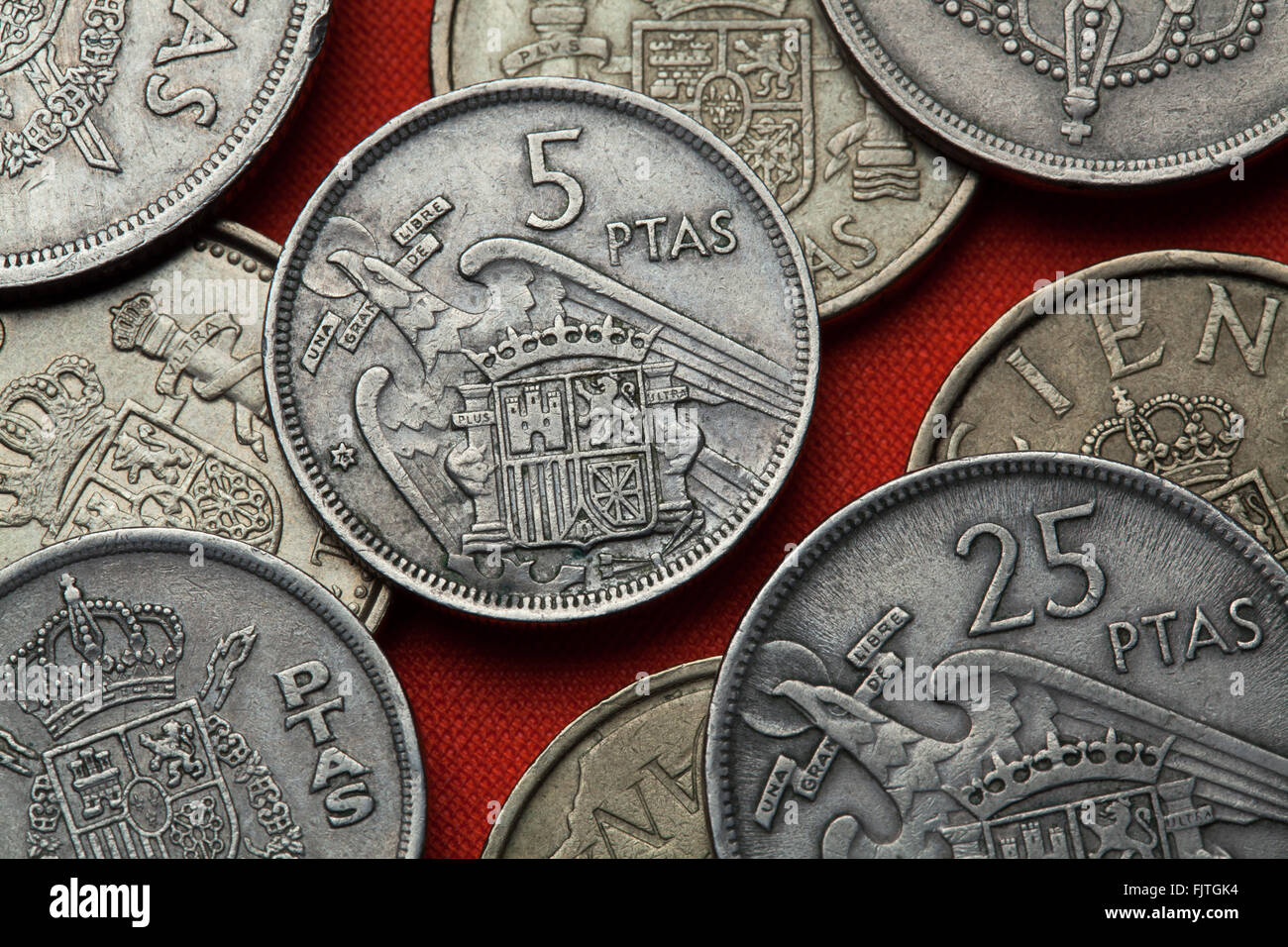 Coins of Spain. Coat of arms of Spain under Franco depicted in the Spanish five peseta coin (1957). Stock Photo
