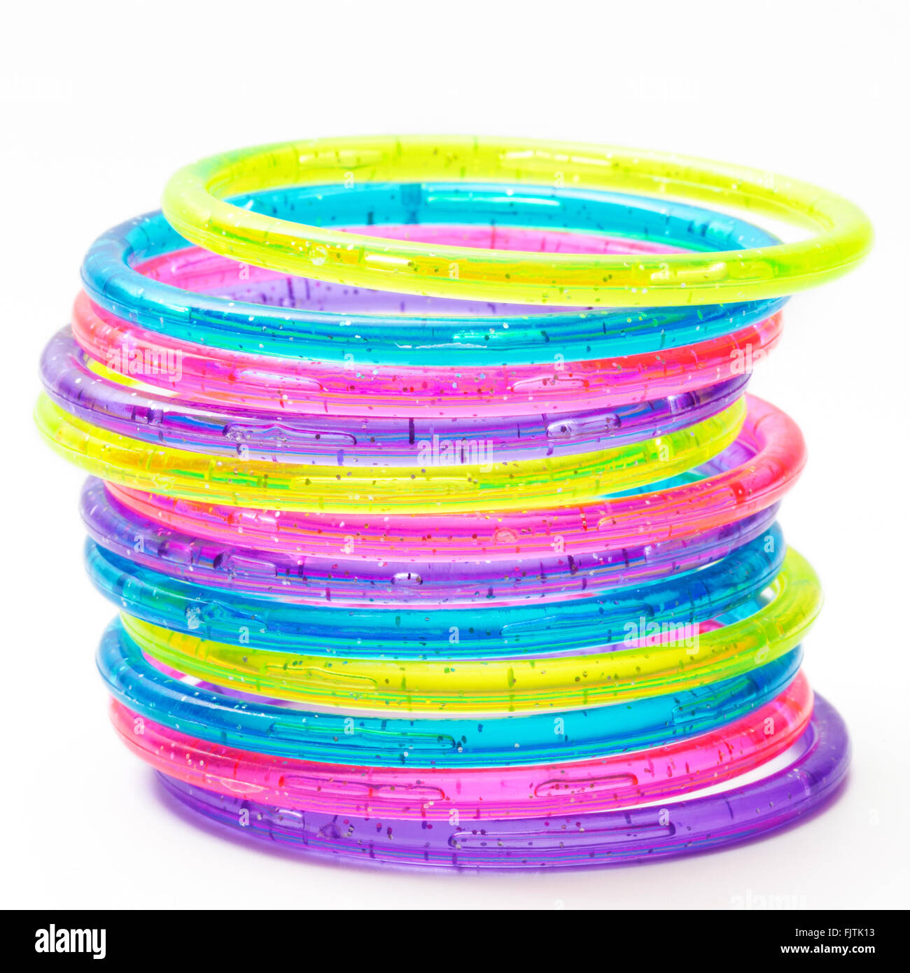 A stack of colorful plastic bracelets Stock Photo - Alamy