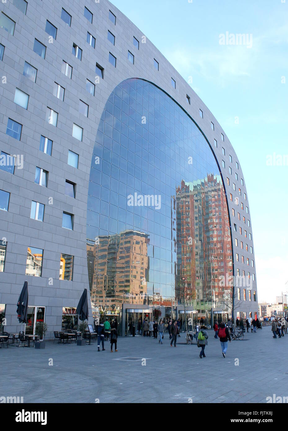Blaak square, reflections in the glass facade of the Rotterdamse Markthal (Rotterdam Market hall), design by MVRDV architects Stock Photo
