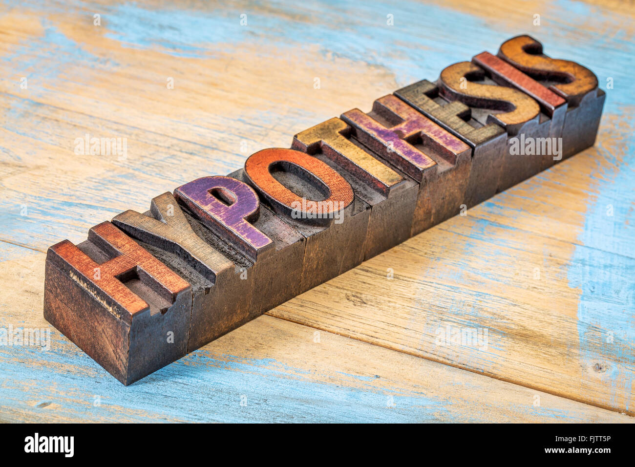 hypothesis word - text in vintage wooden letterpress printing blocks against grunge painted wood Stock Photo