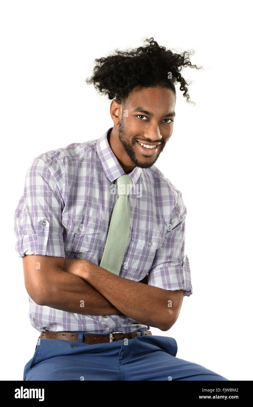 Portrait of young African American businessman smiling isolated over ...