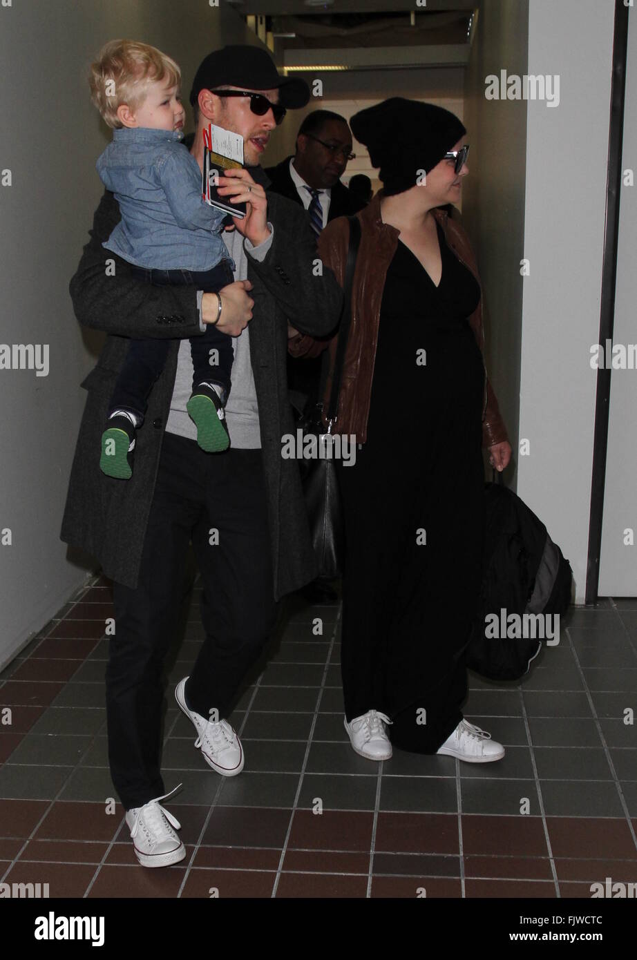 Ginnifer Goodwin, husband Josh Dallas, and their son Oliver arrive at