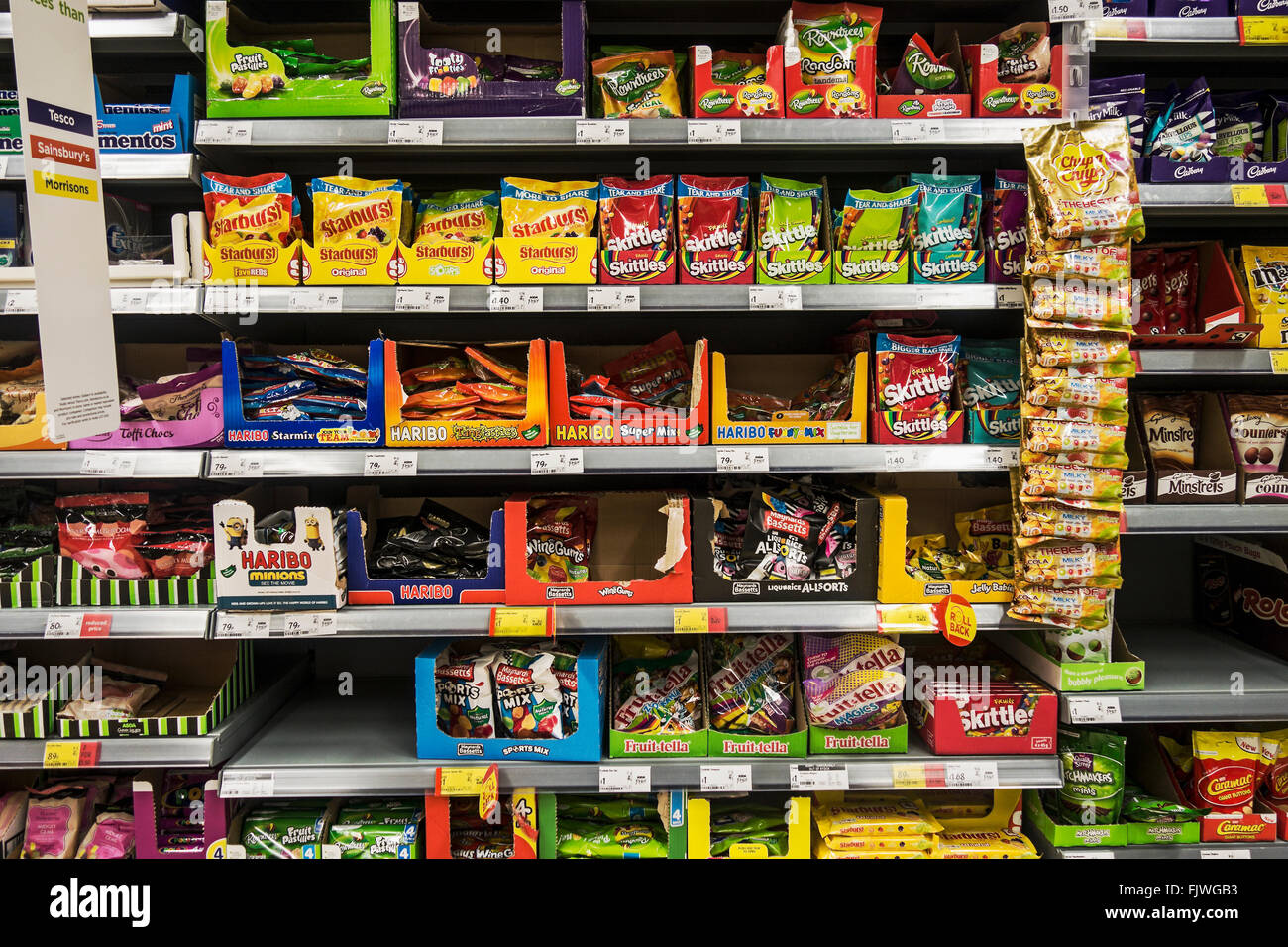 Sweets for sale on display in a supermarket Stock Photo Alamy