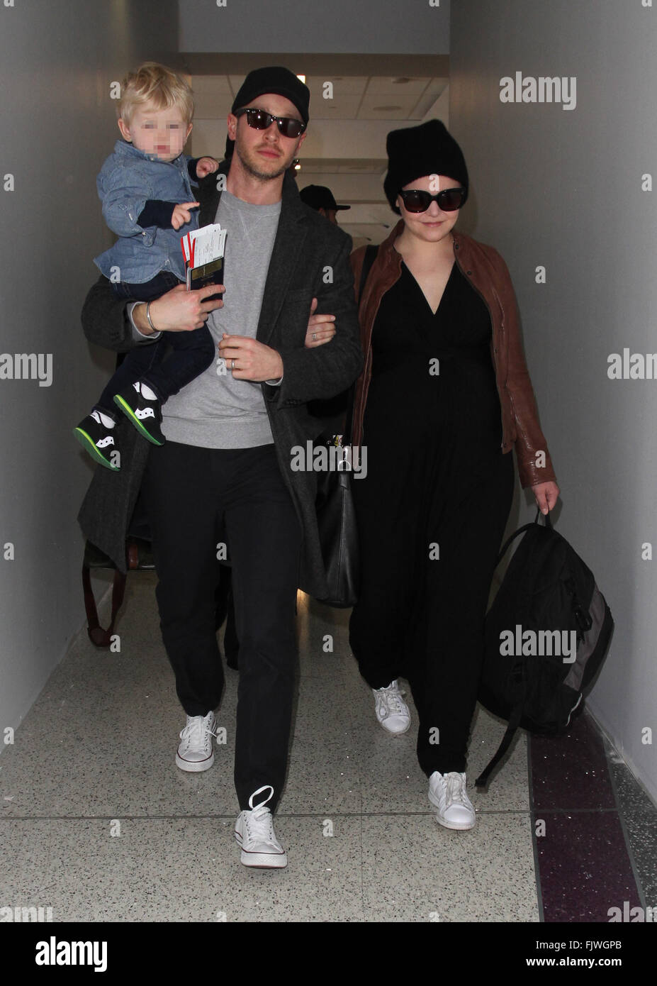 Ginnifer Goodwin, husband Josh Dallas, and their son Oliver arrive at