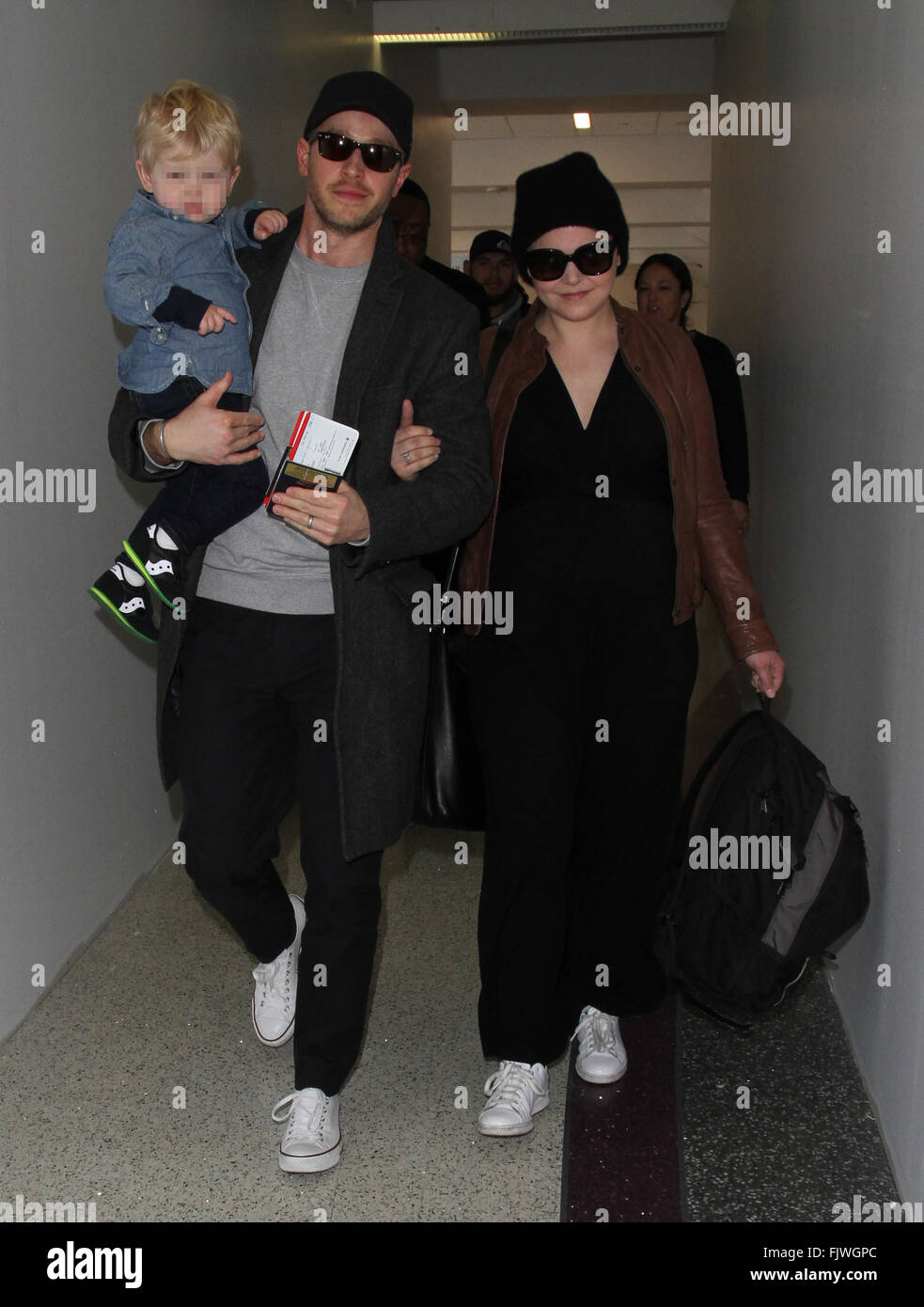 Ginnifer Goodwin, husband Josh Dallas, and their son Oliver arrive at