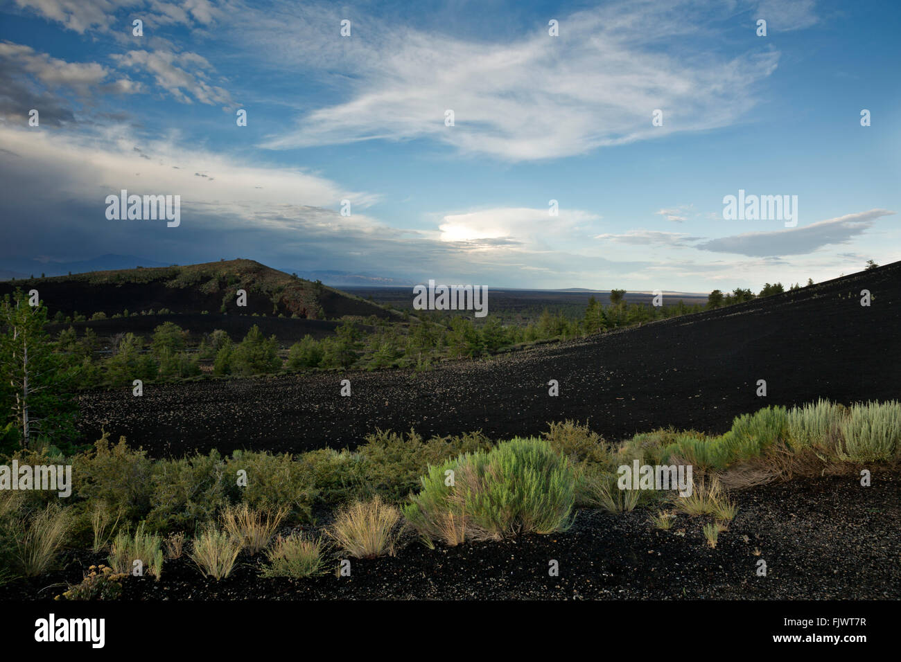 ID00483-00...IDAHO - View over the pumice covered cinder cones from the side of Inferno Cone in Craters of the Moon National Mon Stock Photo