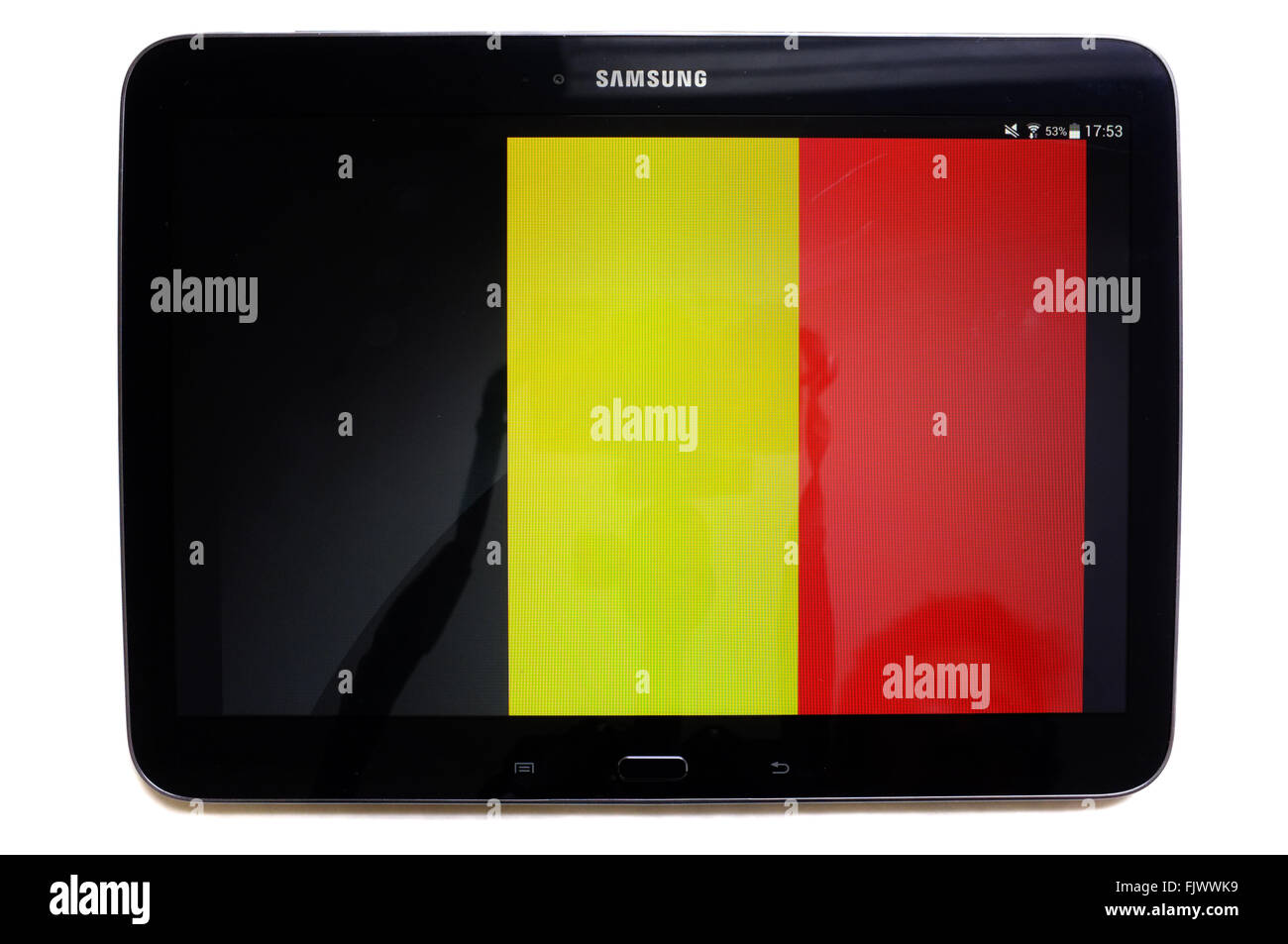 The flag of Belgium displayed on a tablet screen photographed against a white background. Stock Photo