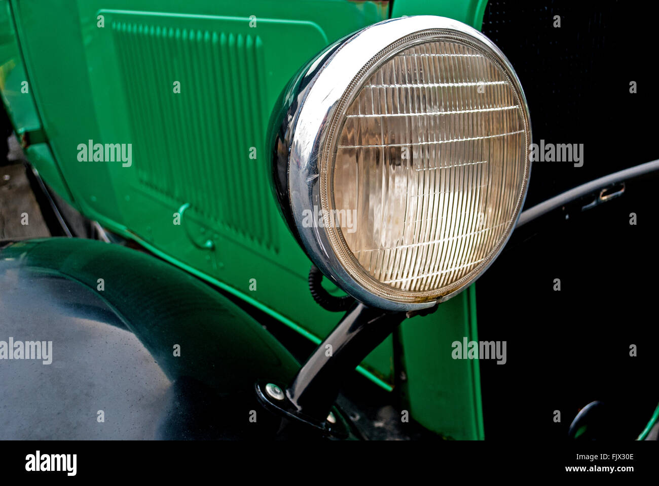 Green car headlight hi-res stock photography and images - Alamy