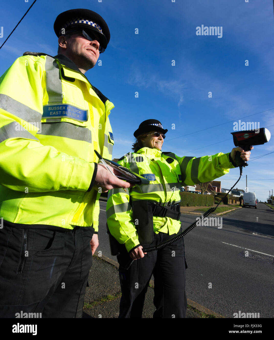 British Police officers carrying out speed checks Stock Photo