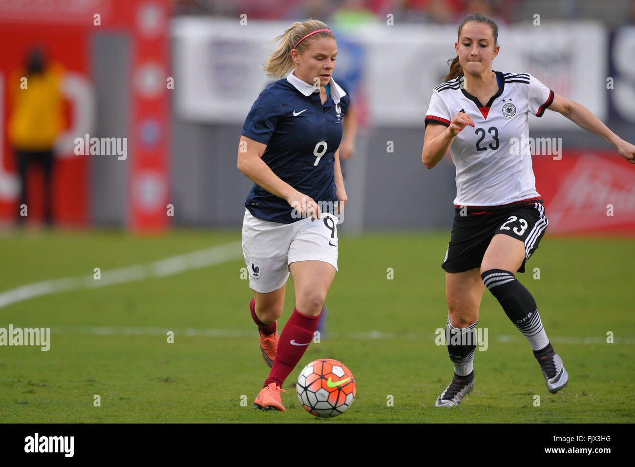 Tampa, Florida, USA. 3rd Mar, 2016. French forward Eugenie Le Sommer (9) brings the ball upfield against Germany midfielder Sara Dabritz (23) during the She Believes Cup at Raymond James Stadium on March 3, 2016 in Tampa, Florida. Germany won the game 1-0. © Scott A. Miller/ZUMA Wire/Alamy Live News Stock Photo