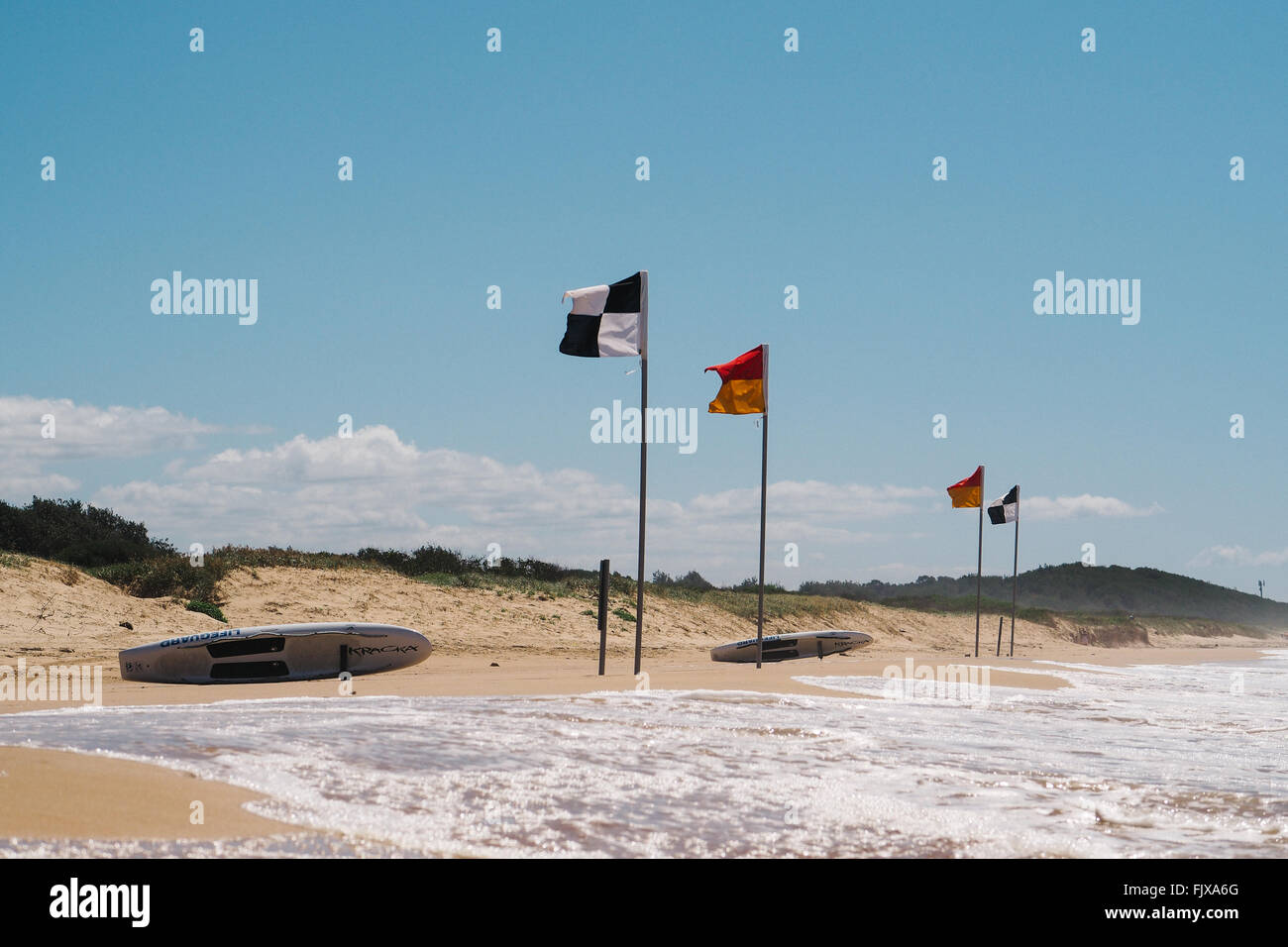 Flags beach surfboards sea sky beach hires stock photography and