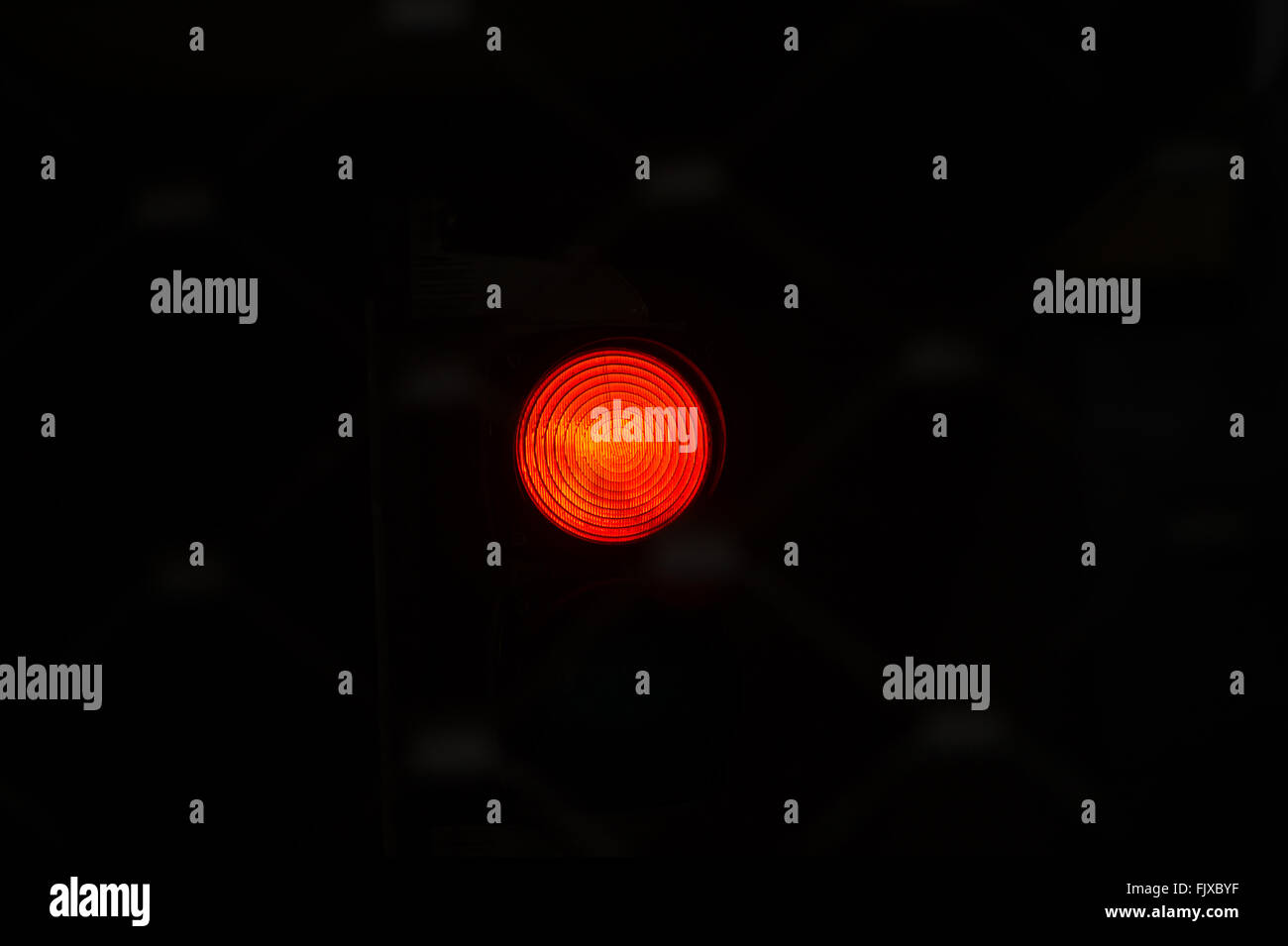 Illuminated Red Light At Night Stock Photo Alamy