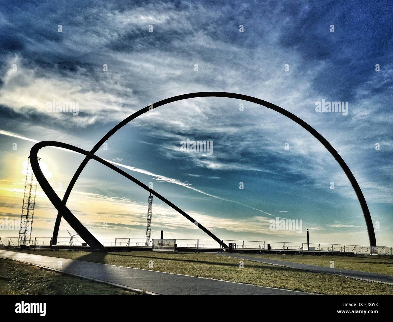 Metallic Arch Structure At Halde Hoheward Against Sky Stock Photo
