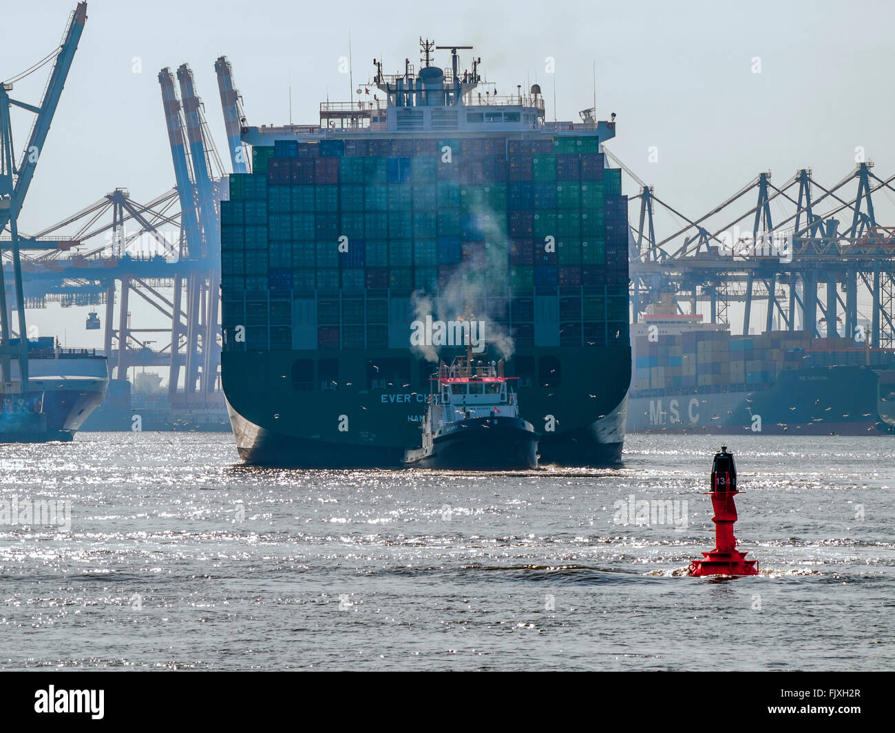 Container vessel 'Ever Charming' of Evergreen berthing in the Port of Hamburg. Stock Photo