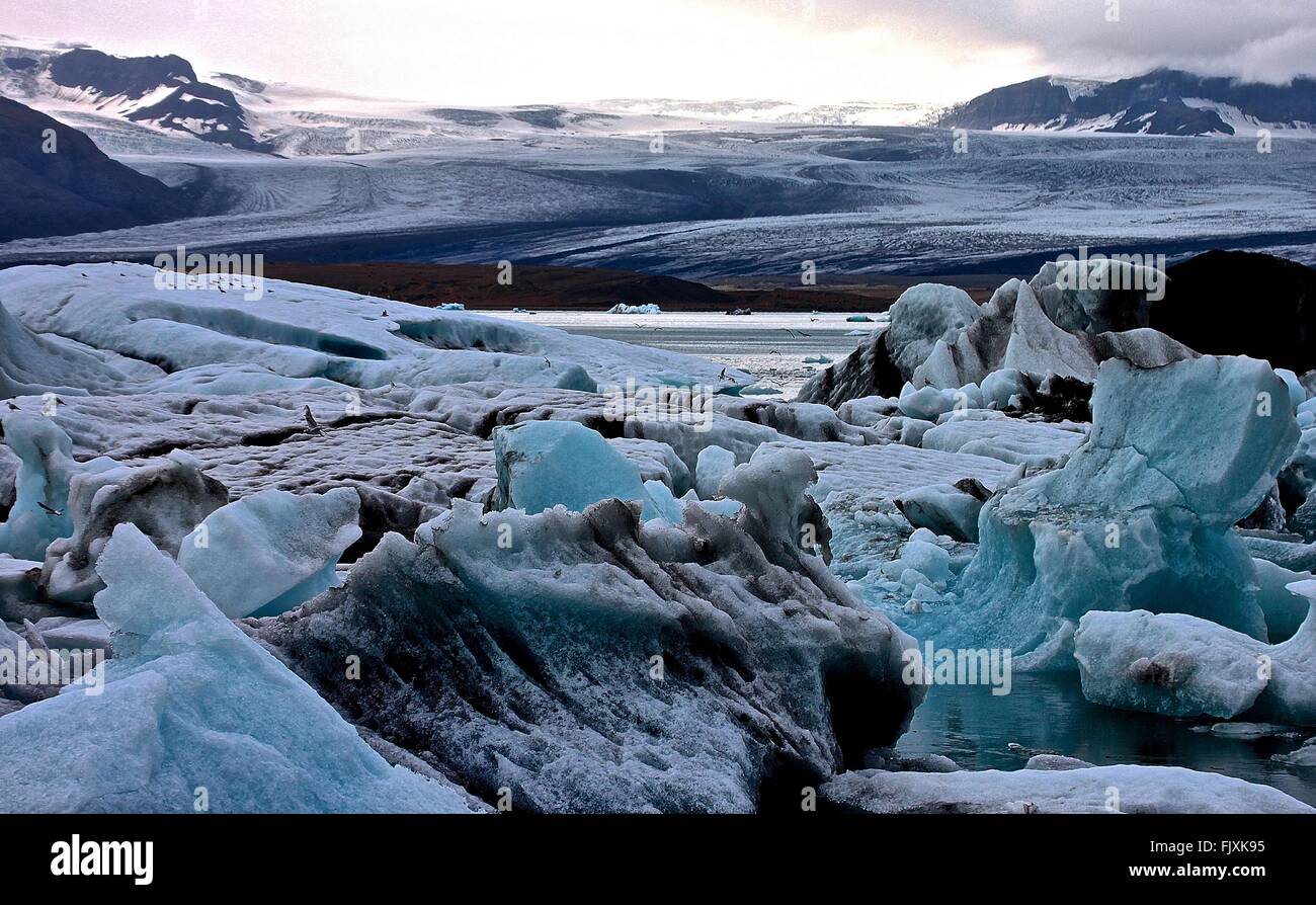 Scenic View Of Glacier And Lake Stock Photo