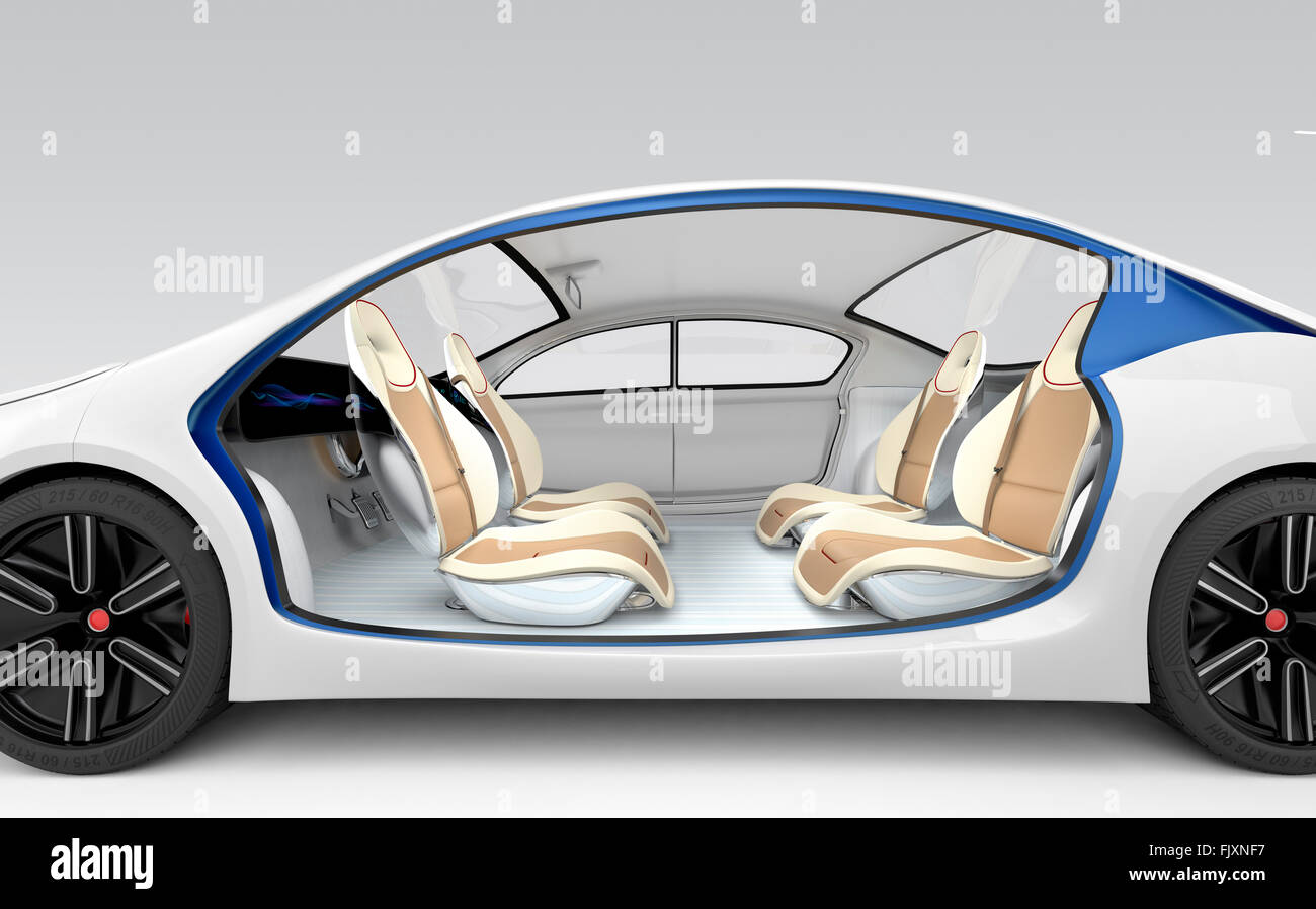 Side view of autonomous electric car. The car offer folding steering wheel, rotatable passenger seat. Original design. Clipping Stock Photo