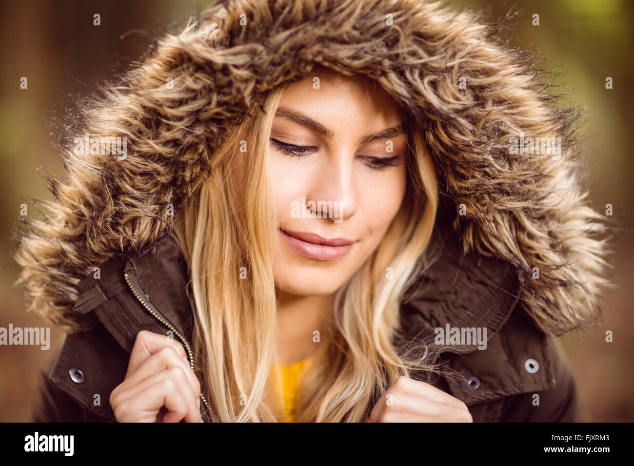 Woman wearing green jumper hi-res stock photography and images - Alamy