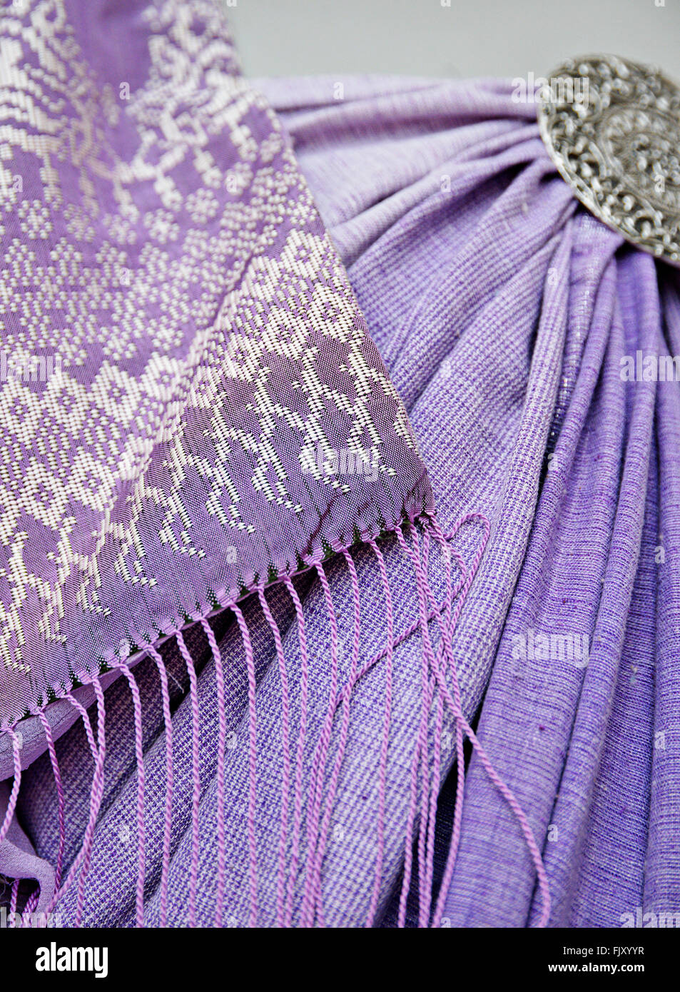 Traditional handicrafts (songket, a clebrational sarong) in Terengganu, Malaysia. Stock Photo