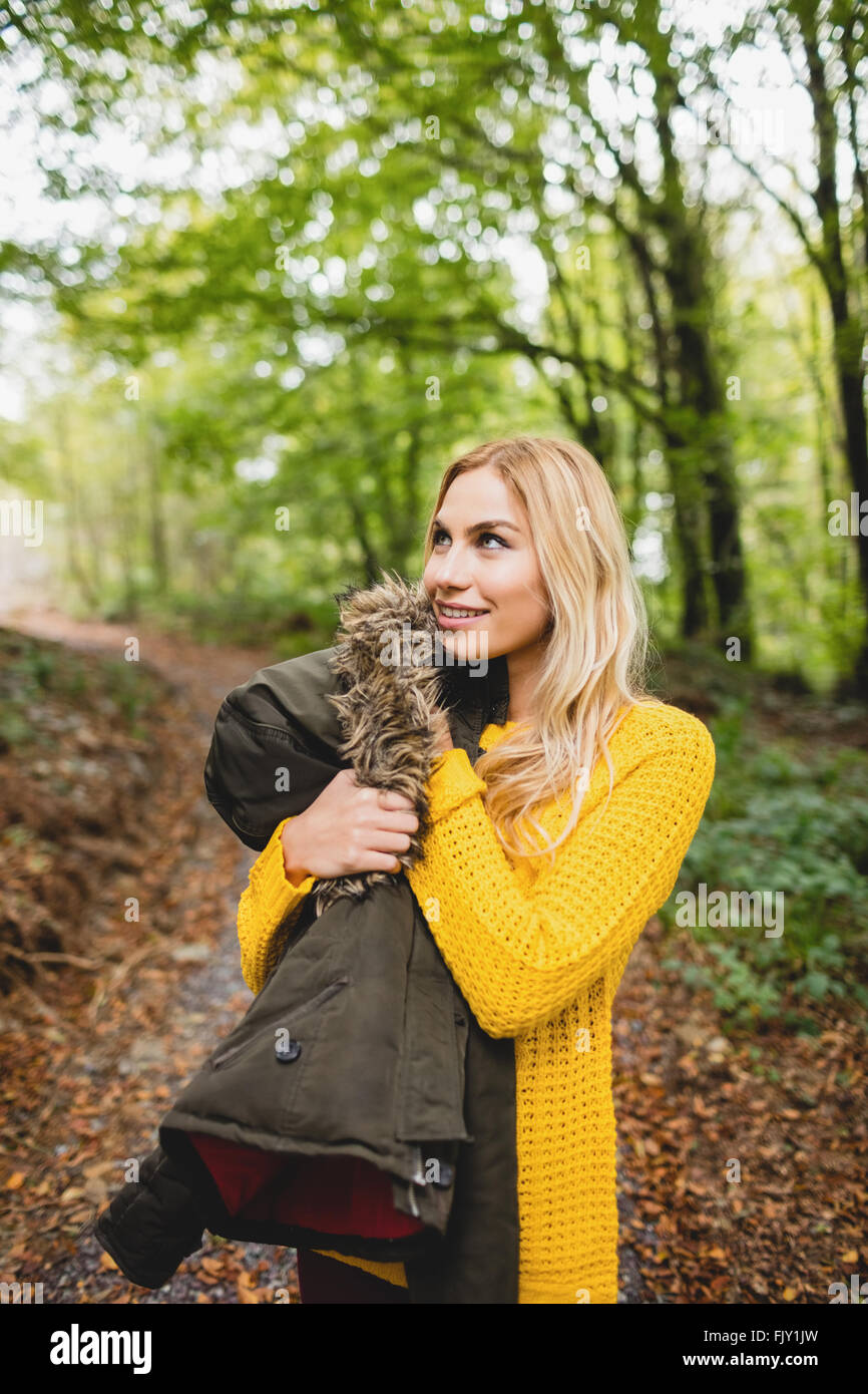 Beautiful blonde woman with arms crossed Stock Photo - Alamy